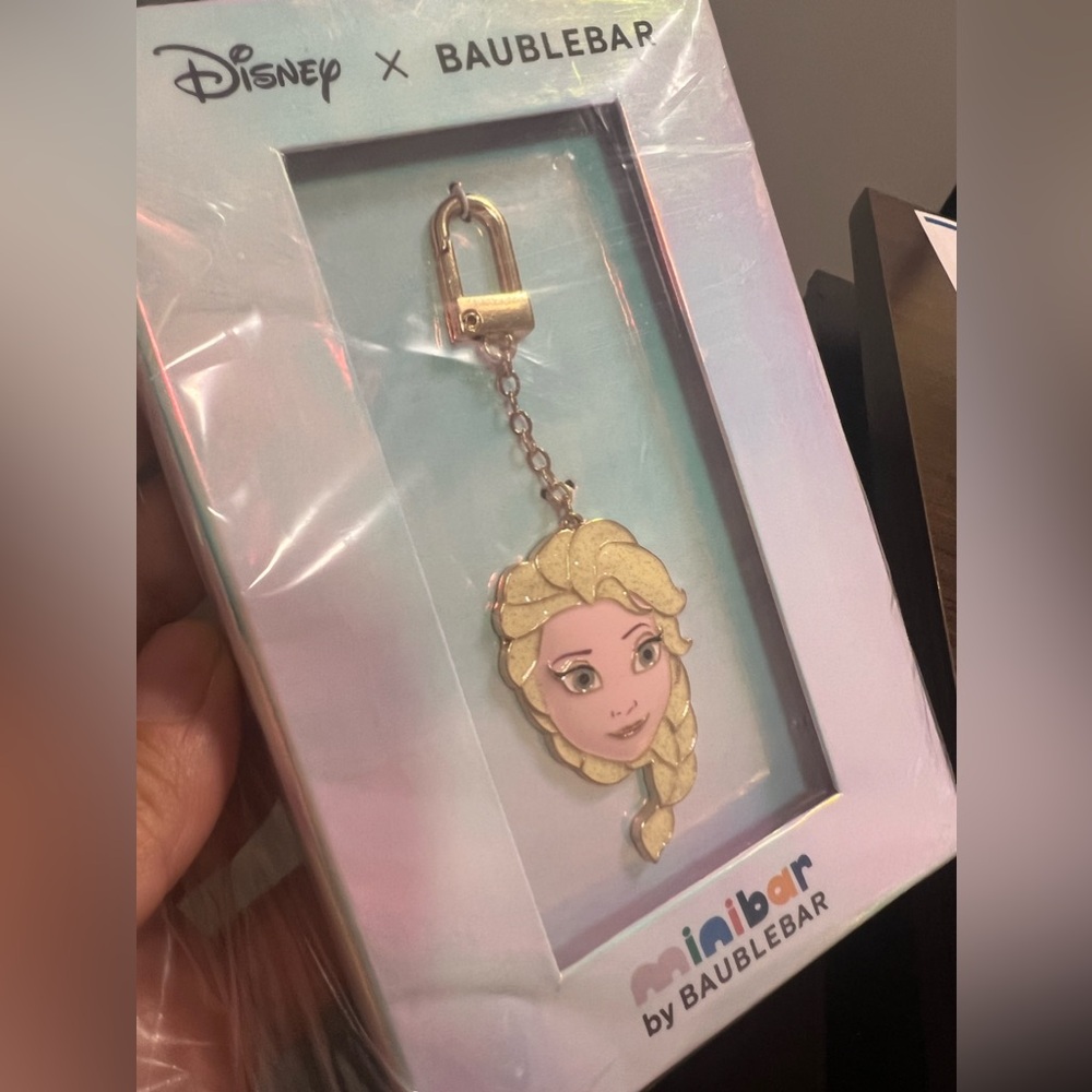 BaubleBar Gold and Pink Character Face Keychain